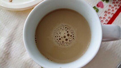 Coffee with milk in cup 