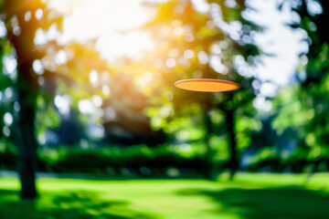 Frisbee golf disc flying in the air. Ultimate or discgolf throw. Course in park or forest in summer. Sport and frolf equipment. Outdoor professional game or hobby. Tournament in nature.