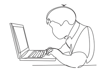 the boy is playing computer