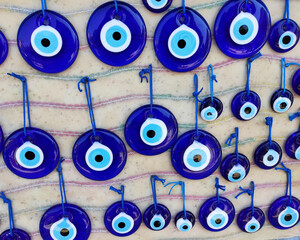 Traditional Oriental Turkish blue pendant decorative amulet for home with an eye against the evil eye, the eye of Fatima