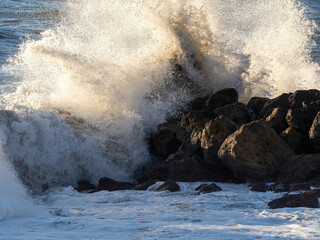 Crashing waves on the beach in massa - obrazy, fototapety, plakaty