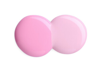 Samples of different nail polishes isolated on white, top view