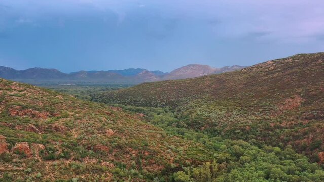 Wilpena Pound scenic rock formation at sunrise at Flinders Ranges as 4k.
