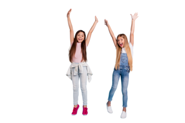 Full length body size view portrait of two people nice lovely attractive cheerful crazy straight-haired pre-teen girls siblings raising hands up great news isolated on blue turquoise background