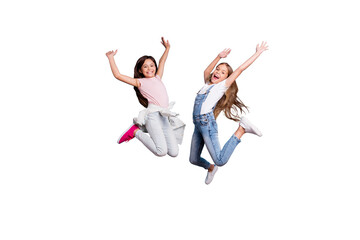 Full length body size view of two people nice-looking crazy lovely attractive carefree straight-haired pre-teen girls having fun great weekend time overjoy isolated over blue pastel background