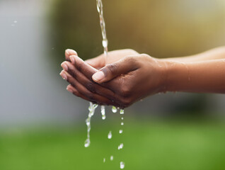 Woman, washing and hands in outdoor for hygiene with water drops for clean, healthy and wellness...