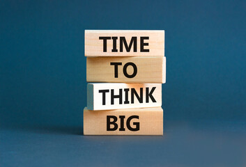 Time to think big symbol. Concept words Time to think big on beautiful wooden block. Beautiful grey...