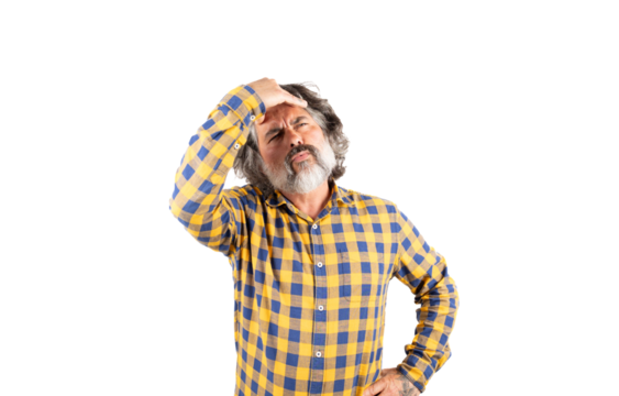 A man with a beard and a plaid shirt complains of a headache. Headache - Powered by Adobe