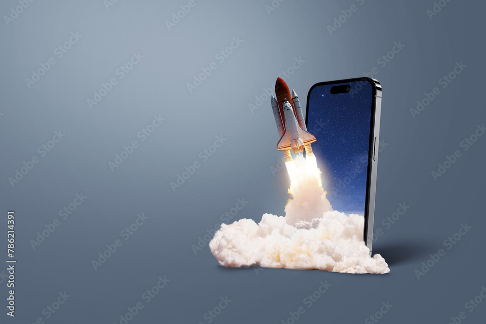 Poster smartphone with a rocket taking off with smoke and blast on a dark background, concept. start up and