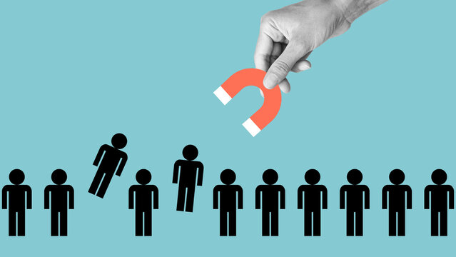 Employee selection or attracting new customers or followers. Magnet pulls employees out of row. Recruitment and human resources management