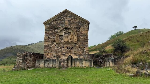 Thaba-Yerdy in Ingushetia. ZEISS, RUSSIA - MAY 19, 2023: Video of the Thaba-Yerdy Temple, the oldest temple in Ingushetia. The Caucasus Mountains. 4K