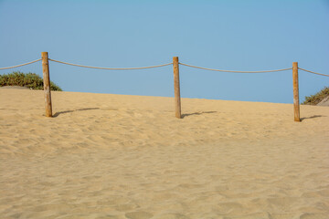 Sand dune with a fence - 786217963