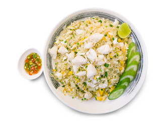 Crab fried Rice, piece of lime and sliced cucumbers in plate and fish sauce chill in white small bowl, isolated on white background with clipping path. Top view.