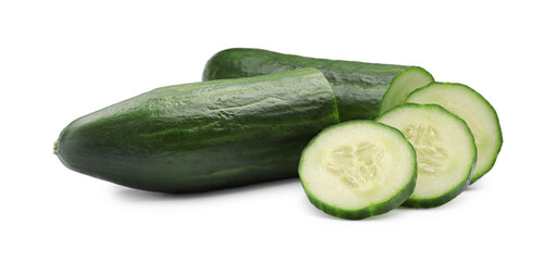 Halves and slices of long cucumber isolated on white