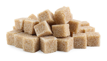 Many brown sugar cubes isolated on white