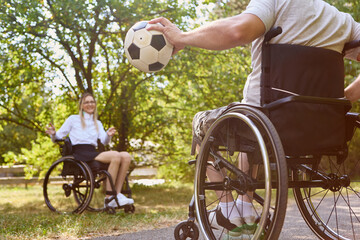 People with disabilities enjoying a game of soccer outdoors