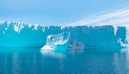 Melting giant icebergs by the coast of Greenland, on a beautiful summer day - Melting of a iceberg...