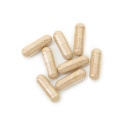 Vitamin capsules isolated on white, top view. Health supplement