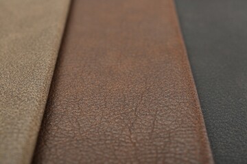 Different natural types of leather as background, closeup view