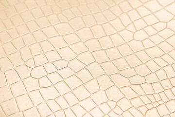 Beige natural leather as background, closeup view