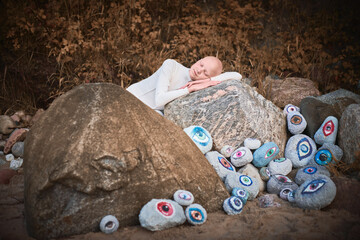 Young hairless girl with alopecia in white futuristic costume sleeping sweetly in surreal landscape...