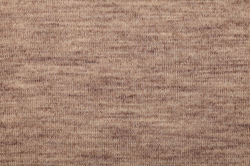 Fototapeta na wymiar Brown knitted fabric textured background