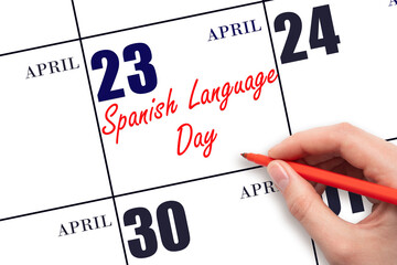 April 23. Hand writing text Spanish Language Day on calendar date. Save the date.