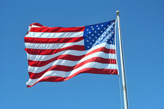 A dynamic and patriotic image of the American flag waving in the wind, symbolizing national pride and freedom. Suitable for use in government, military, and historical contexts.