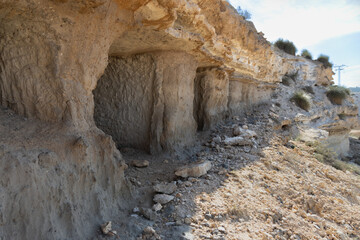 Natural walk next to the júcar river, popular cave houses, carved into the mountain,  region of La Manchuela, in Alcalá del Júcar (Albacete, Spain).