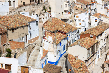 Panoramic view of the town of Alcalá del Júcar. Its popular Roman bridge, cave houses, river...