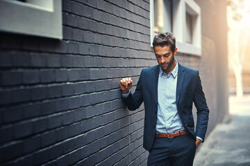 Confident, businessman and thinking in city by wall for corporate fashion, trendy and stylish suit....