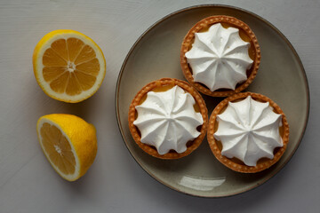 Homemade Lemon Tartlets on a Plate, top view. Flat lay, overhead, from above. - 786247518