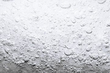 macro soda bubble texture,Soda water with ice as background, closeup