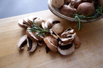Champignon mushroom on the wooden table. healthy food concept decoration background. Mushrooms composition on wooden plate.