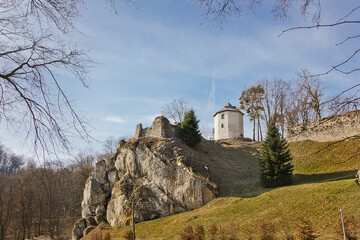 old Gothic Ojcow Castle on the rock. Landscape with a castle in early spring  in Poland