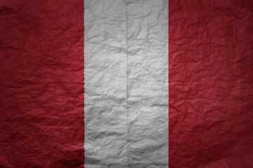 big national flag of peru on a grunge old paper texture background