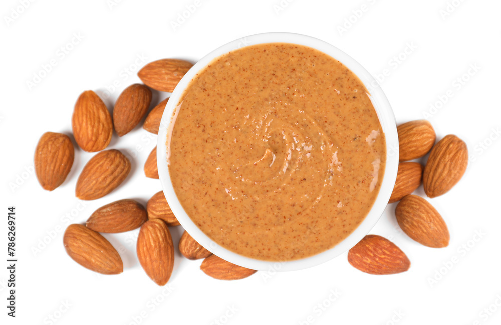 Wall mural Delicious nut butter and almonds isolated on white, top view