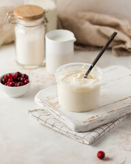Classic curd mass with milk and cranberries, ideal for wholesome culinary creations.
