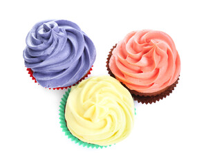 Different tasty cupcakes with cream isolated on white, top view