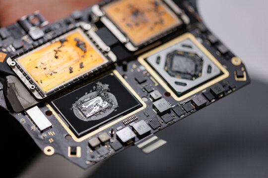 RUSSIA - March 23, 2024: Repair Macbook pro Apple, maintenance and replacement of thermal paste, broken screen and replace used rechargeable batteries for recycling