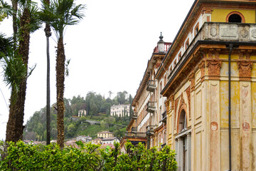 Old building and palm trees in Bellagio on Lake Como in northern Italy in Europe - 786282185