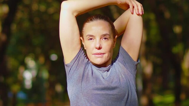 Beauty in motion, woman working-out to maintain suppleness and strength