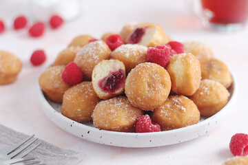 A plate wit traditional berliner cakes with jelly	