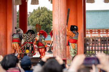 Kyoto, Japan - February 3 2024 : Heian Jingu Shrine Setsubun festival. Performers wearing an oni ( demon or ogre ) costume in the traditional Japanese shinto ritual ceremony.
