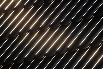 Black metal roof tiling with wavy shape pattern and glowing reflections