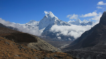 Clouds creeping up the Khumbu Valley and Mount Ama Dablam, Nepal.