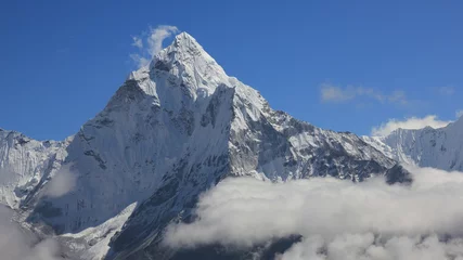 Papier Peint photo Ama Dablam Snow capped peak of Mount Ama Dablam surrounded by clouds, Nepal.