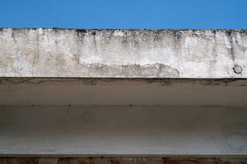 cornice facade of the building with infiltration and erosion of the plaster. the problems of...