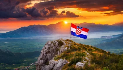 Foto auf Acrylglas The Flag of Croatia On The Mountain. © Daniel