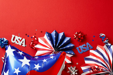 4th of July Independence Day American flag color balloons and decorations on red background.